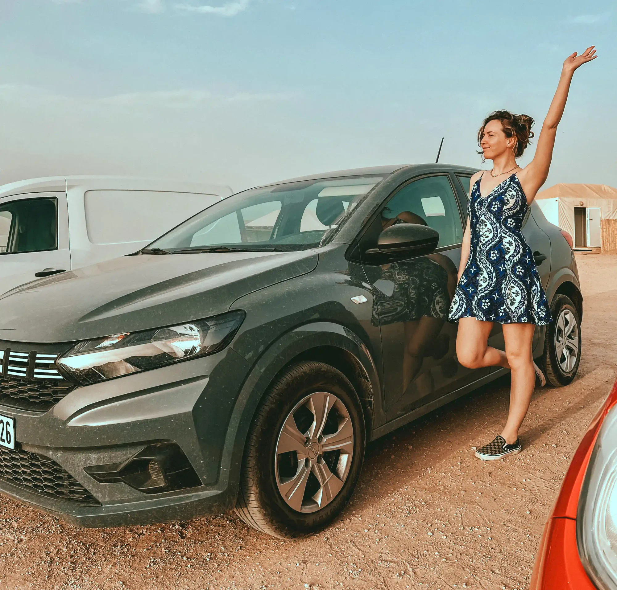 Girl standing next to car rental in Morocco