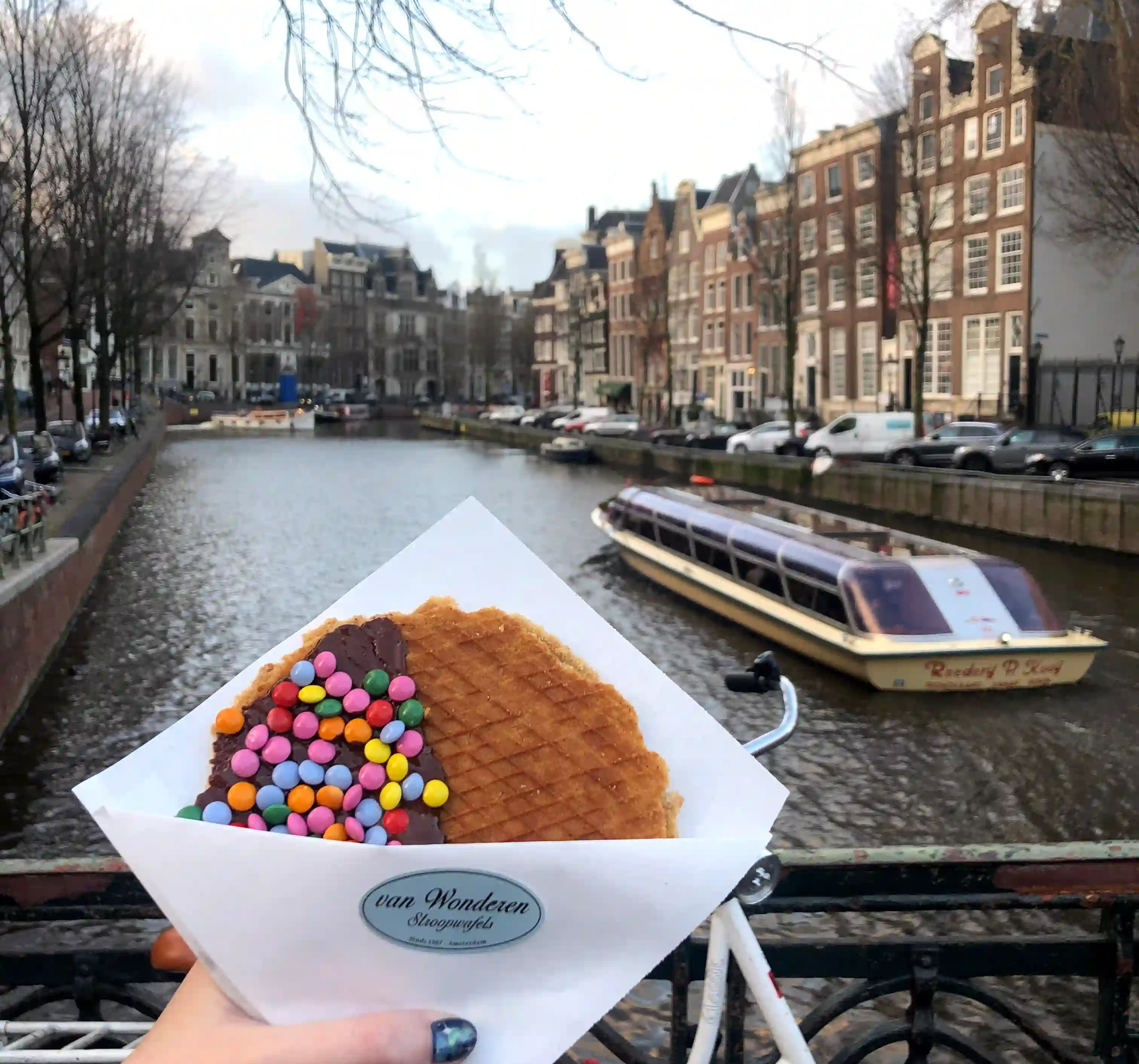 Delicious Stroopwafel overlooking canals, Amsterdam, Netherlands.