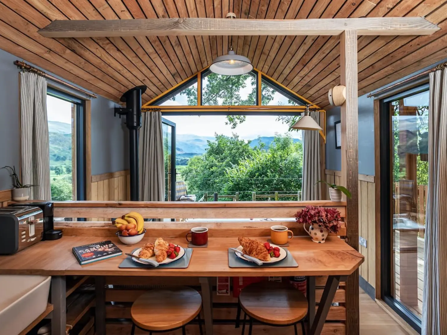 Helvellyn Hut Interior and Breakfast Bar with views over the hills.