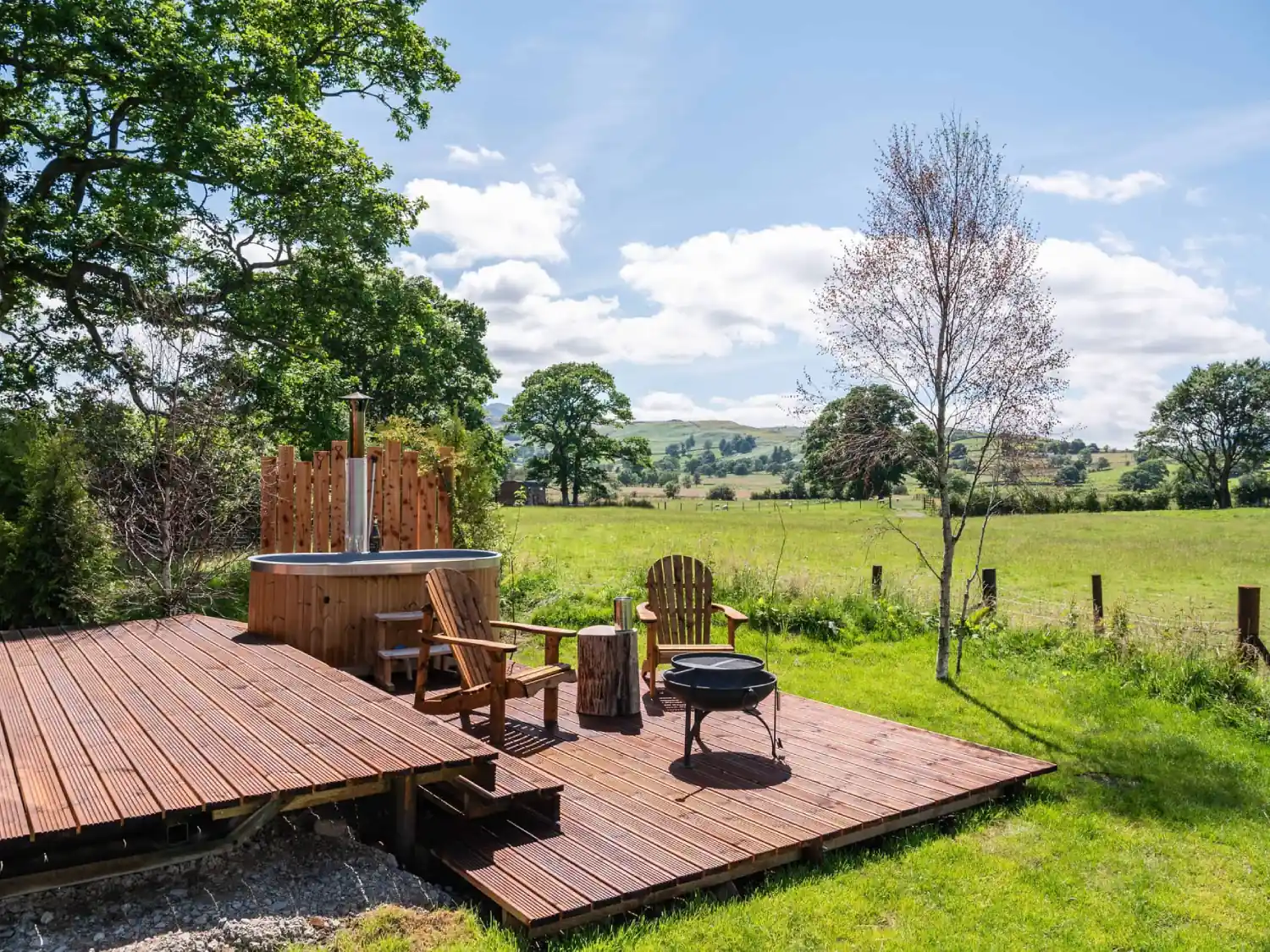 The Fawn Lodge (In The Vale) Outdoor Decking and Hot Tub with views over the countryside.