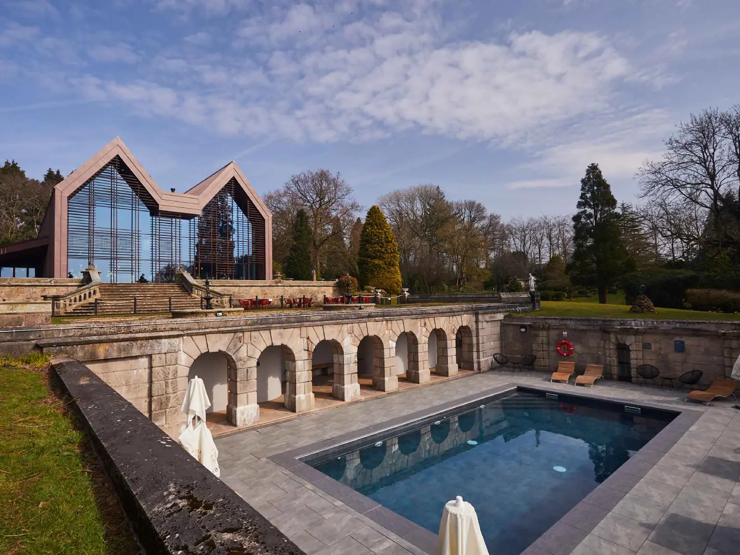 The Outdoor Heated Pool and Restaurant at The Tawny Hotel.