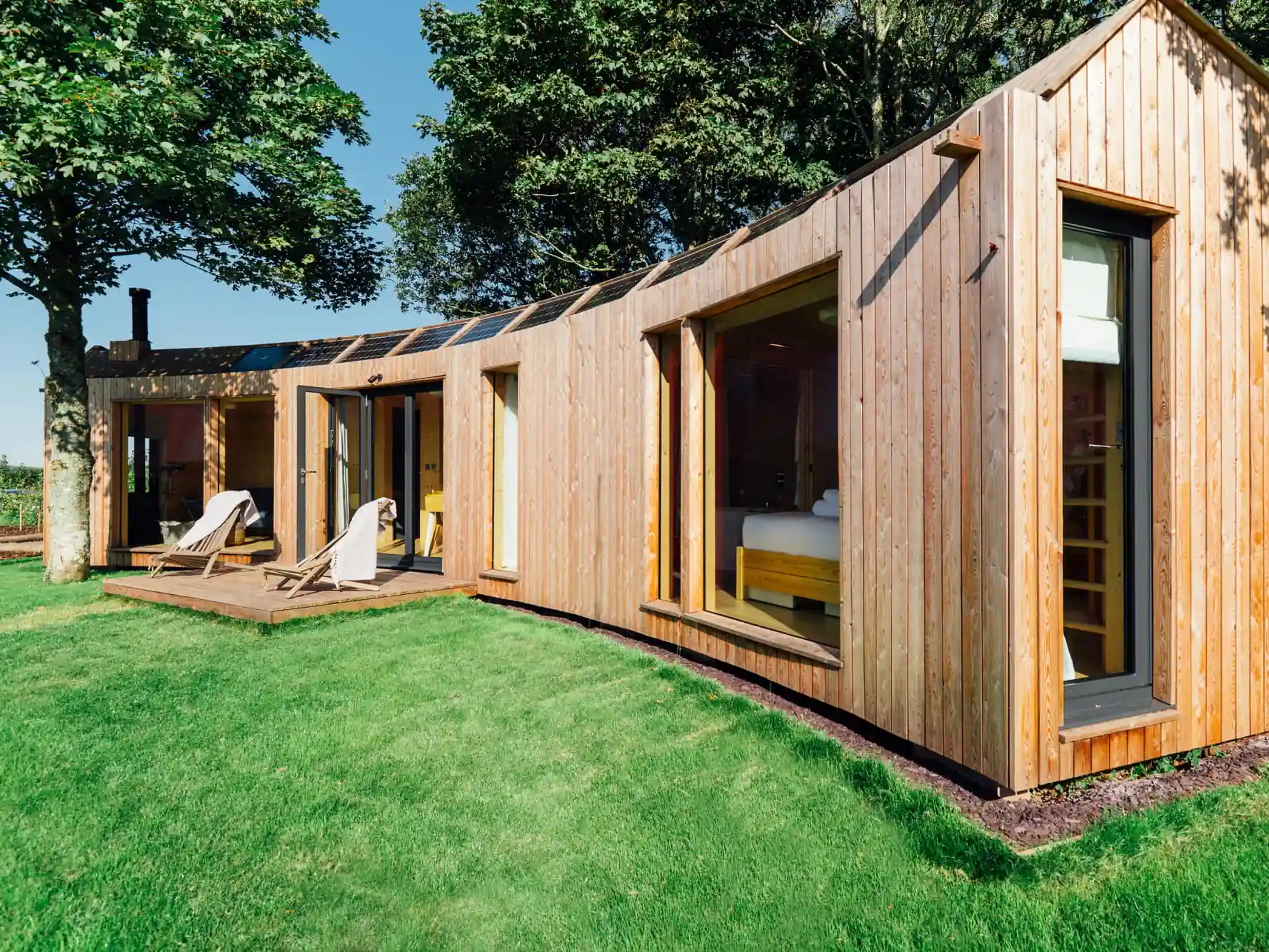 The exterior of the Curve lodge with outdoor decking area.