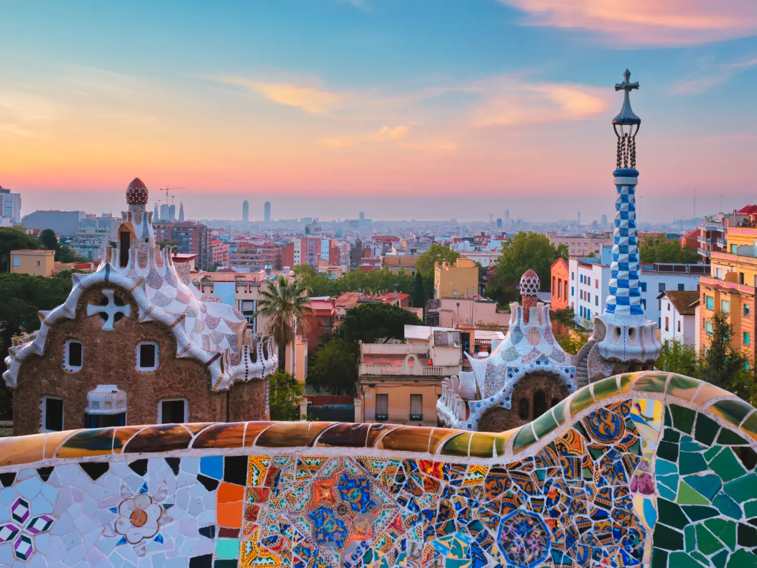 Sunrise city view from Park Guell, Barcelona, Spain.