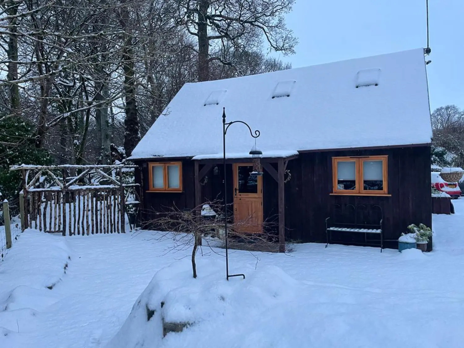 Watermill nook cabin covered in snow.