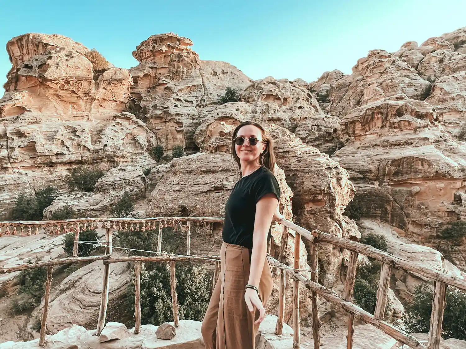 Girl standing in front of viewpoint near Little Petra in Jordan.