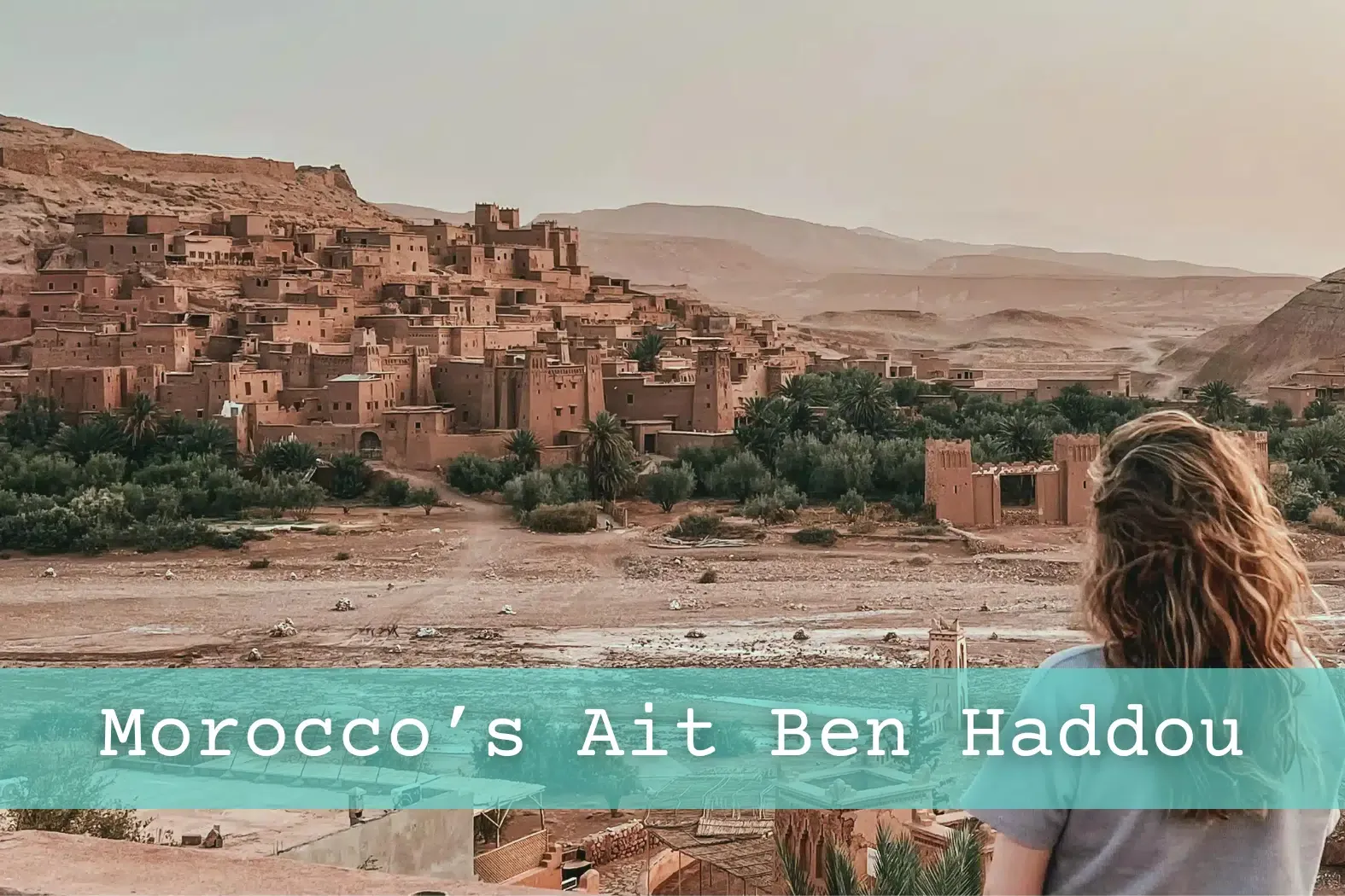 Girl looking at the sunrise over Ait Ben Haddou