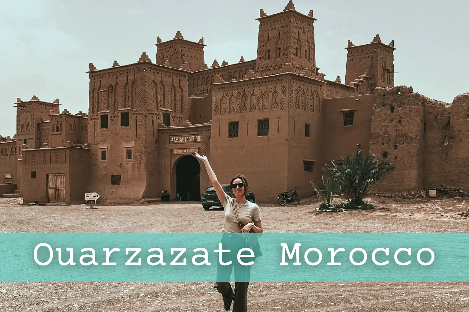 Girl standing in front of Kasbah Amridil near Skrouda.